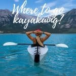 Woman resting and thinking where to go kayaking